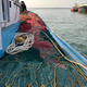 A bed of purse seine nets.